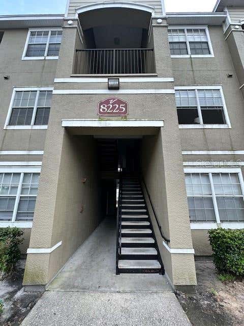 Photo of 8225 Claire Ann Dr #203, Orlando, FL 32825 (MLS # S5152179)
