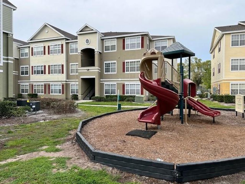 Photo of 8225 Claire Ann Dr #203, Orlando, FL 32825 (MLS # S5152179)