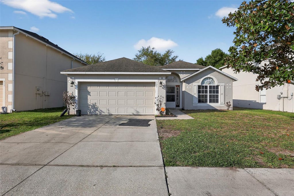Photo of 321 Squires Grove Drive, Winter Haven, FL 33880 (MLS # TB8517299)