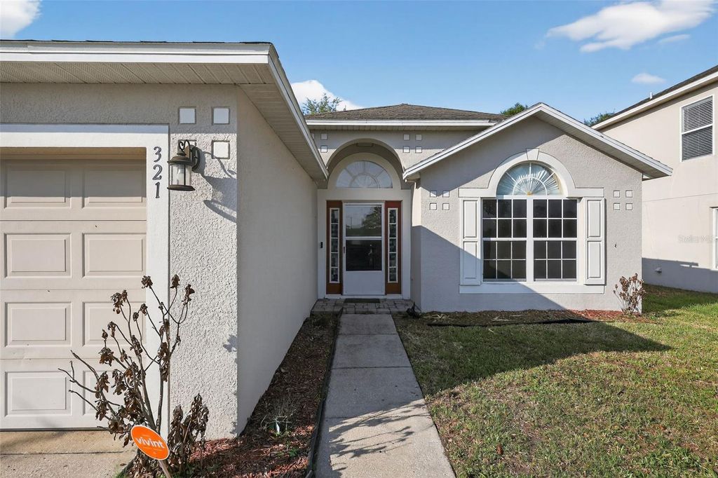 Photo of 321 Squires Grove Drive, Winter Haven, FL 33880 (MLS # TB8517299)