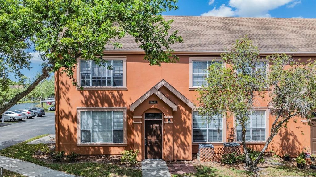 Photo of 9846 Lake Chase Island Way, Tampa, FL 33626 (MLS # TB8486048)