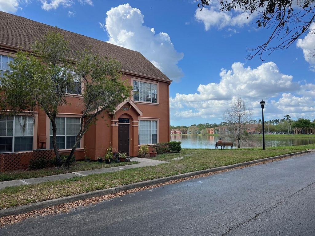 Photo of 9846 Lake Chase Island Way, Tampa, FL 33626 (MLS # TB8486048)