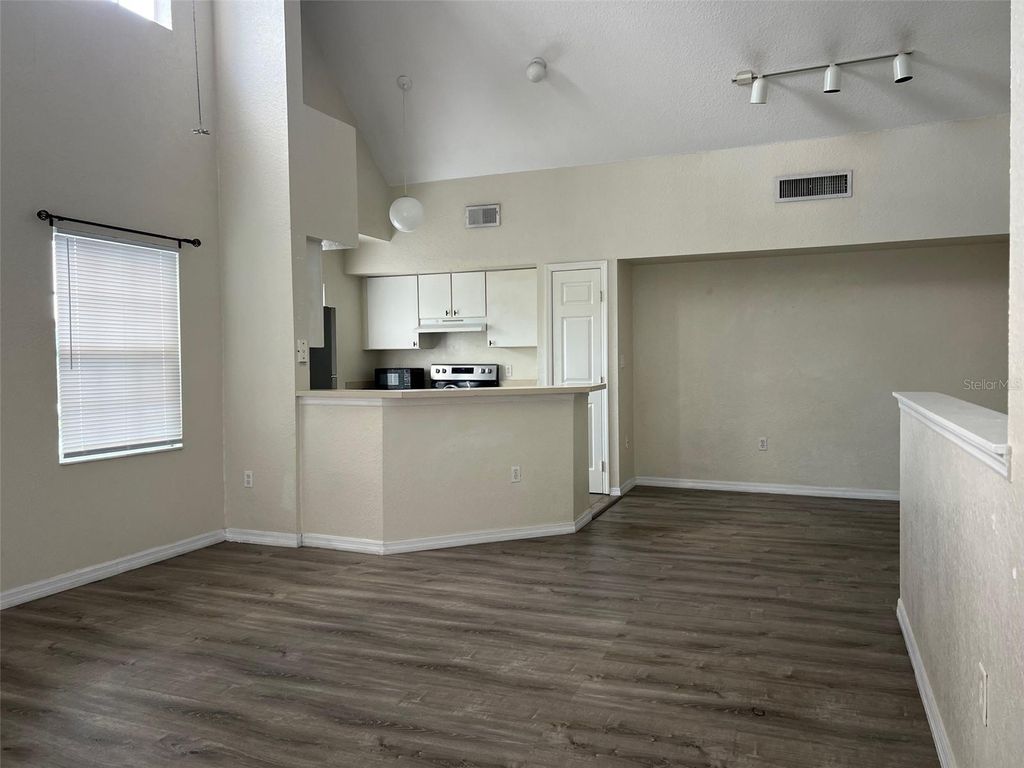 Photo of 9846 Lake Chase Island Way, Tampa, FL 33626 (MLS # TB8486048)