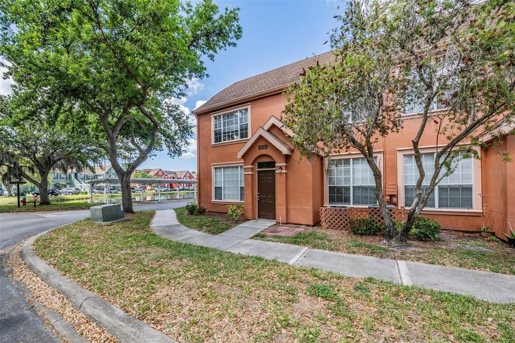 Photo of 9846 Lake Chase Island Way, Tampa, FL 33626 (MLS # TB8486048)