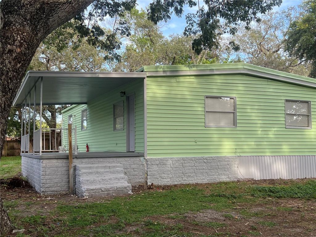 Photo of 6606 Corbin Lane, New Port Richey, FL 34653 (MLS # TB8400690)