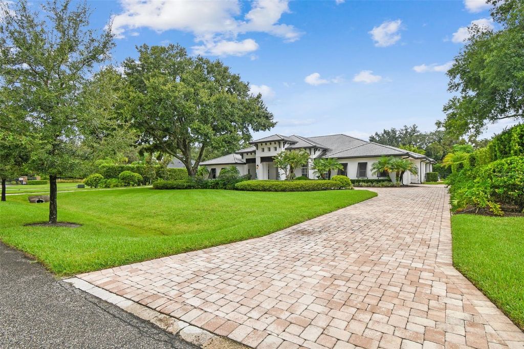 Photo of 8515 Loch Drive, Odessa, FL 33556 (MLS # TB8420770)