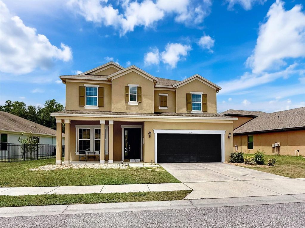 Photo of 4916 Rolling Green Drive, Wesley Chapel, FL 33543 (MLS # TB8389963)