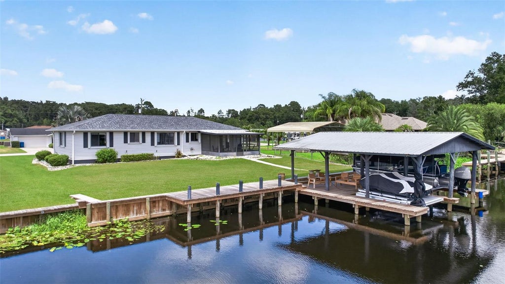 Photo of 1613 Juno Trail, Astor, FL 32102 (MLS # V4950864)