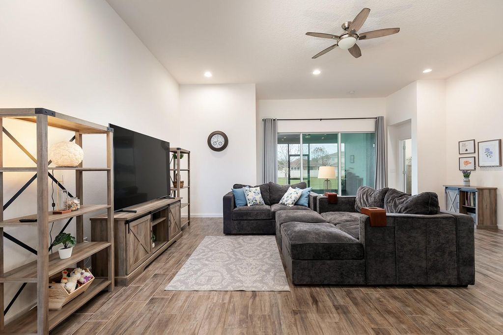 Photo of 2451 Rush Bay Way, Orlando, FL 32824 (MLS # O6395468)