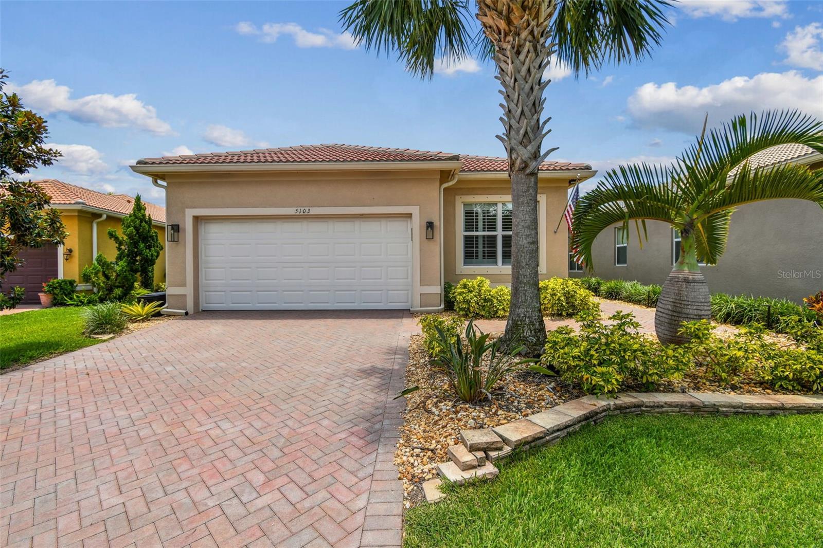 Resort-Style Living at Its Finest!
Welcome to your dream home in the highly desirable 55+ resort community of Valencia Lakes! With over $100K in upgrades and additions since purchased in 9/2022 this awe-inspiring home is tucked away on a quiet cul-de-sac with stunning water views, this exquisite “Positano Model” perfectly combines luxury, comfort, and Florida charm.
This thoughtfully designed 3-bedroom, 2-bathroom ( OR 2 BEDROOM + DEN) residence with a 2-car garage showcases a spacious, open-concept layout and upscale upgrades throughout. Step through the inviting screened front porch into a grand foyer with tray ceilings, where you’ll be welcomed by elegant light fixtures, crown molding, plantation shutters, and freshly painted interiors.
Enjoy water views from the generous living space and your oversized, covered lanai — complemented by a NEW (2024)beautifully paved open-air patio (36 x16) that’s ideal for outdoor entertaining or simply soaking up the serenity. NEW (2024) hurricane shutters on the sliders offer quick and easy storm protection.
The gourmet kitchen is a true showstopper, featuring upgraded glazed cabinetry, NEW quartz countertops, a glass tile backsplash, pull-out shelving, recessed lighting, and ALL NEW (2023) stainless steel appliances, sink & plumbing fixtures. A charming dining nook is the perfect spot for casual meals and morning coffee.
The split-bedroom floor plan offers maximum privacy. The luxurious primary suite includes two custom walk-in closets with NEW (2023)California Closet systems and a spa-inspired en-suite bathroom with NEW dual vanities and a large walk-in shower. Two additional bedrooms — also with NEW California Closets — and a full guest bathroom that just underwent a $16k RENOVATION (2024) are thoughtfully placed on the opposite side of the home.
The well-equipped laundry room features built-in cabinetry and a utility sink, NEW WASHER & DRYER (2023) and leads to a pristine garage with NEW (2023)epoxy floors, overhead storage, NEW (2023)wall-mounted storage cabinets, a soft water system, and a NEW (2023) 220V outlet for electric vehicle charging. In addition this home has a NEW HVAC SYSTEM (2024) and NEW HOT WATER SYSTEM (2024)
And here's the best part — this home is outfitted with SOLAR PANELS that are completely PAID-OFF, keeping the monthly electric bill UNDER $15!
Valencia Lakes sets the gold standard for active adult communities, offering a resort-style heated pool, lap and resistance pools, state-of-the-art fitness center, steam rooms, saunas, pickleball, tennis, bocce ball, basketball, billiards, card rooms, an internet café, dog park, RV/boat storage, walking trails, and more. With hundreds of clubs, classes, and social events, there’s always something fun and fulfilling to do.
Conveniently located just 30–45 minutes from Tampa, St. Petersburg, and Sarasota, this home is the perfect blend of peaceful retreat and city accessibility.
Don’t miss your chance to live the Florida lifestyle you’ve always dreamed of — schedule your private showing today!