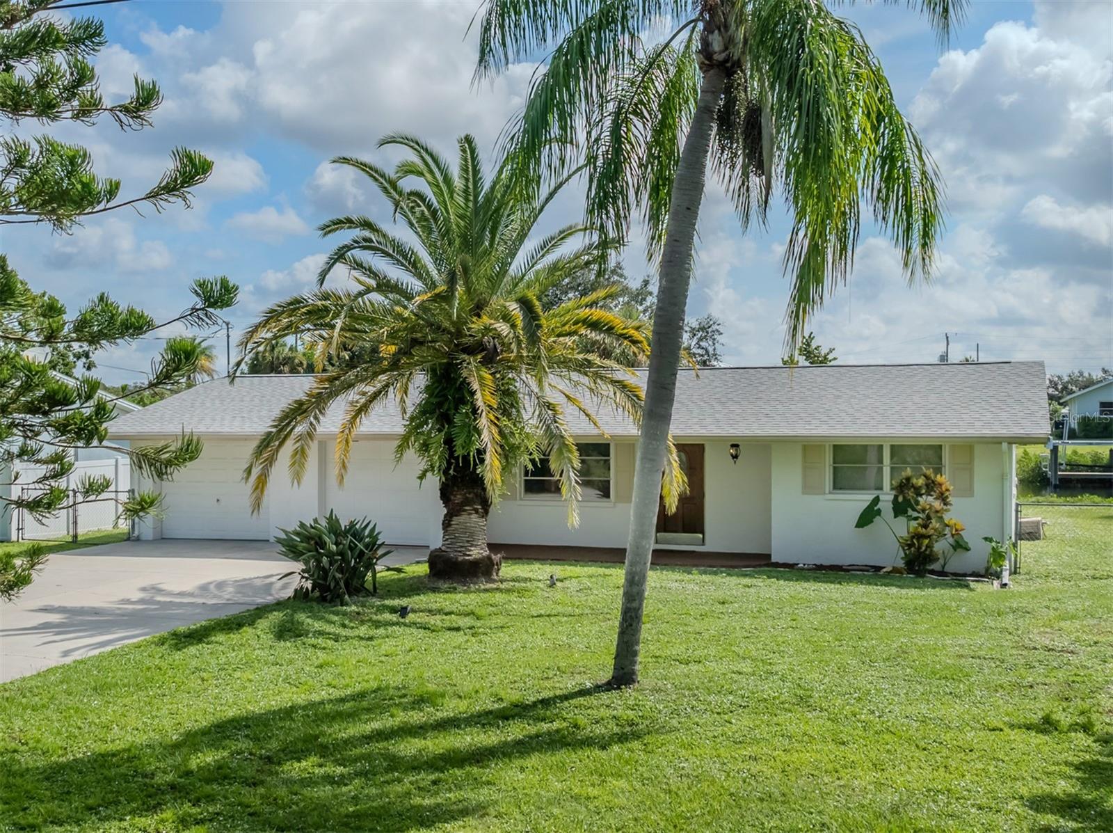 Waterfront Nokomis home with direct access to the gulf. This unique property also comes with a small boat (john) and kayak slip across the street via another canal. This charming home is on a short cul-de-sac street featuring a two-car garage, two bedrooms, two baths. Short distance for biking at Legacy Trail for trails and bike paths. Home plumbing pipes have been updated and second garage has plumbing ready for another additional bath if you desire. Quiet and serene to enjoy your morning coffee on your screened-in lanai and has water views of the canal with plenty of wildlife. Fish from your dock. Close to shopping and Interstate 75. A gem that won't last long.