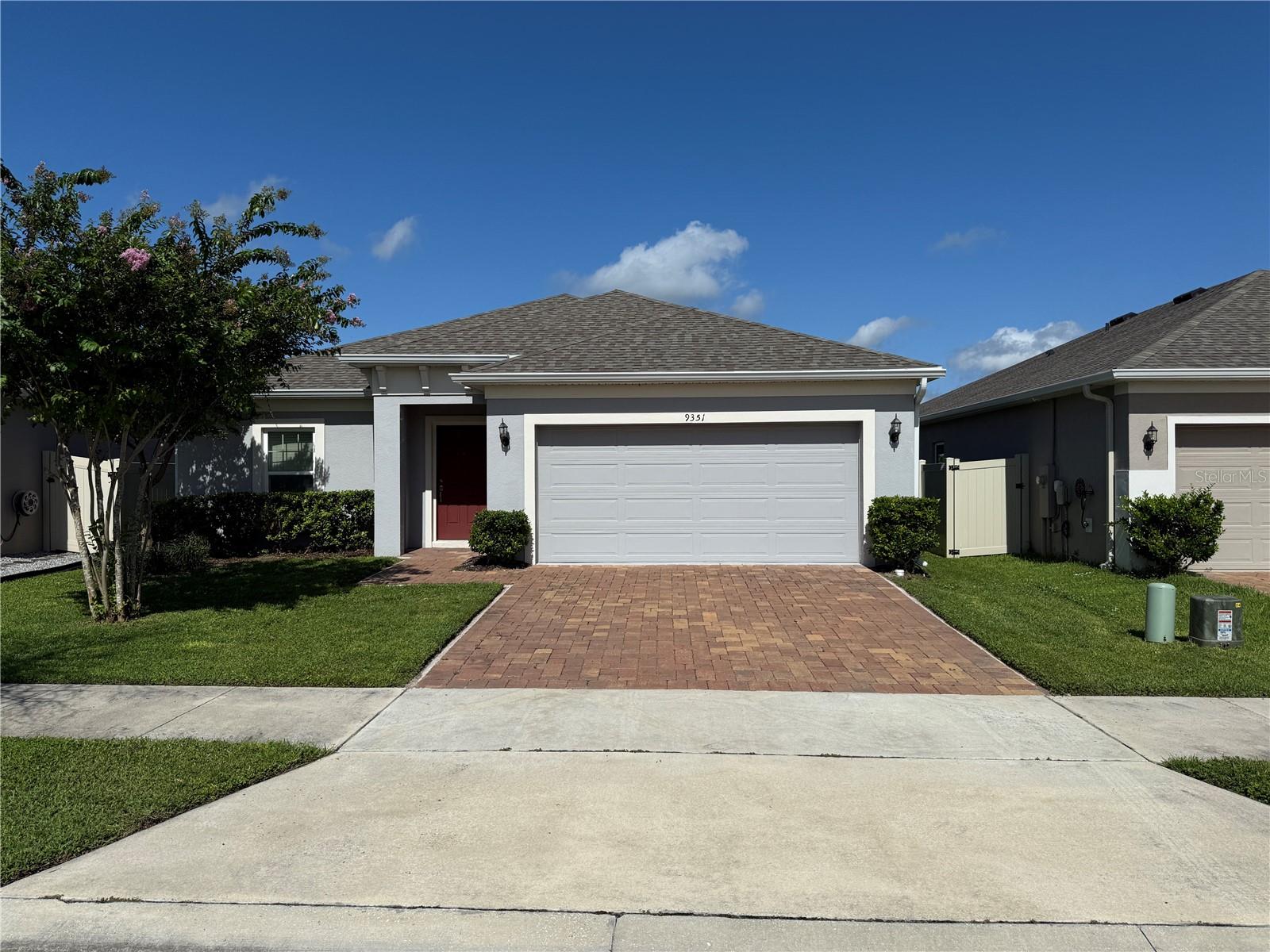 This beautiful home at Cypress Oaks includes 3 bedrooms and 2 bathrooms, an open floor plan with upgraded 42 inch cabinets, large kitchen island, stainless steel kitchen appliances, and quartz countertops in the kitchen and main bathroom. Washer and Dryer included. Floors tiled throughout with the exception of the bedrooms. All the bedrooms have new luxury vinyl plank flooring. The interior is freshly painted in the modern color of "Icicle". Family room has slider glass door leading to the lanai, and then into the fenced in backyard. There is also a community pool and cabana available for your enjoyment. This home is off County Road 565A in Groveland, just outside of Clermont. It is convenient to the South Lake Trail for hiking, biking and walking as well as being close to the Turnpike Interchange.