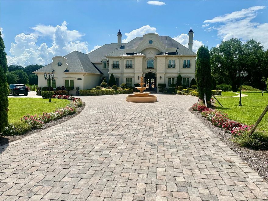 Welcome to the epitome of luxury living in the Savannah Ridge Community. This exclusive pool home combines elegance sophistication, and tranquility in one captivating package. Step in a world of opulence where you will be greeted by a elegant foyer that flowes seamlessly into a spacious living area adorned with exquisite finished and designer touches throughout. The gourmet kitchen is a chef's dream, boasting six bedroom and six bathrooms within 6,493 square feet of space, boasting state of the art appliances, custom cabinetry, with Spanish marble floor. This home has chandelier from Czech Republic, crown molding and ornamental iron works throughout. There is an indoor GYM and an office on the first floor for the family. The home has a full outdoor kitchen and the pool has a swim up bar. It is located minutes away from the 429 and excellent shopping area and the new hospital.