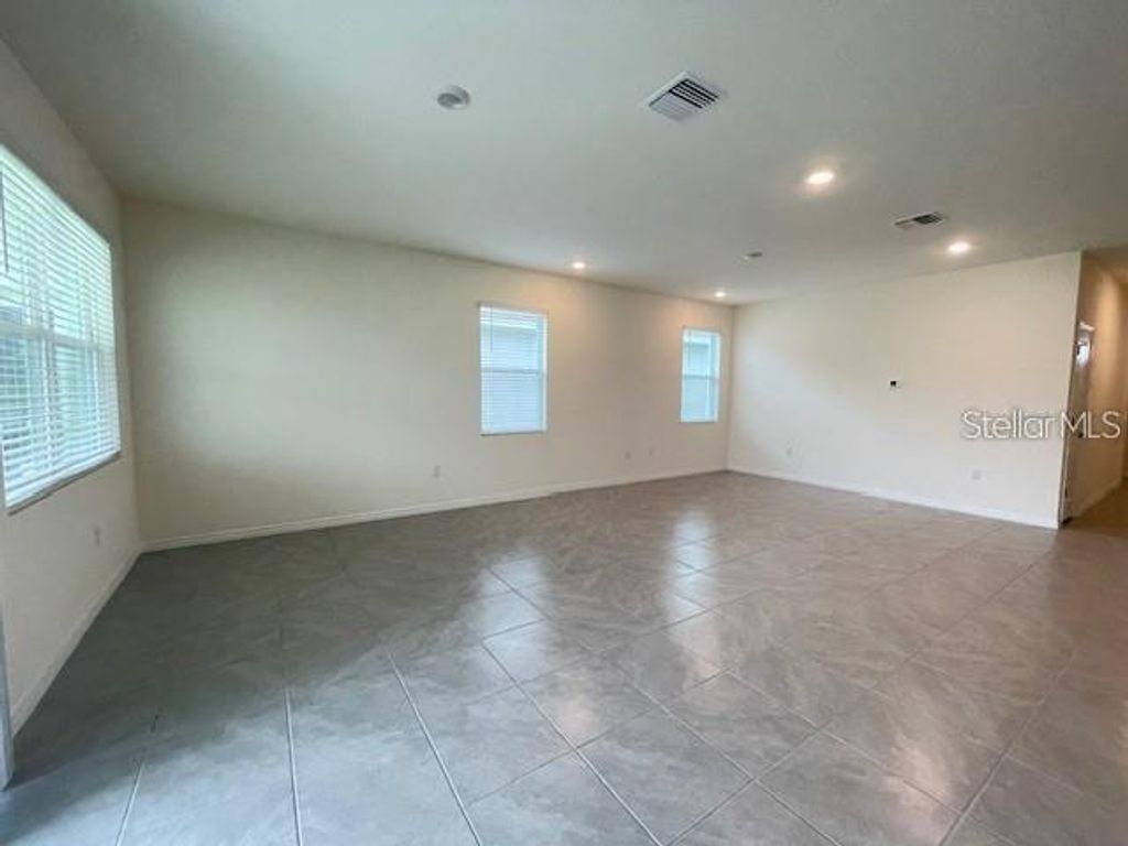 Photo of 5084 Stokes Way, Wildwood, FL 34785 (MLS # OM718570)