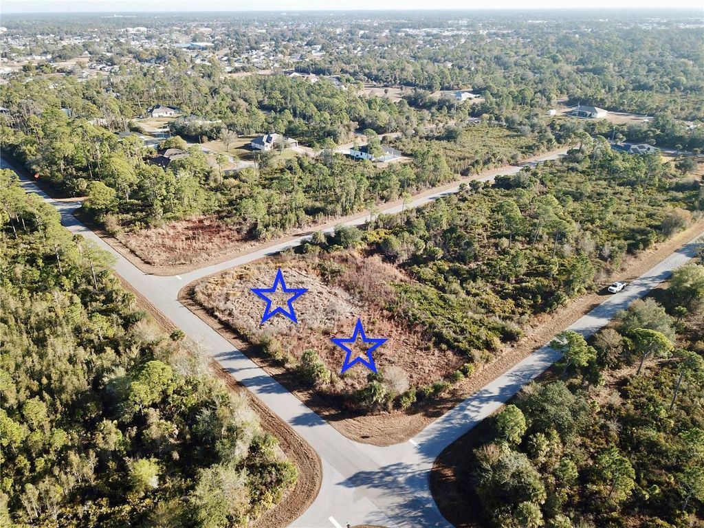 Photo of 12373 College Avenue, Port Charlotte, FL 33953 (MLS # C7521440)