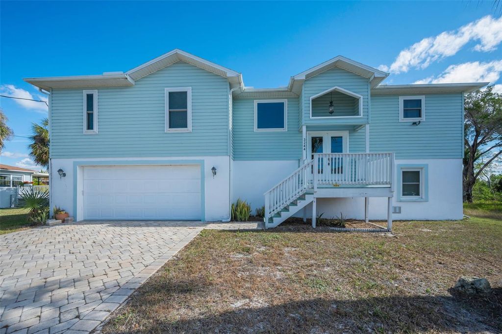 Photo of 3244 Rose Arbor Drive, Hernando Beach, FL 34607 (MLS # TB8463142)
