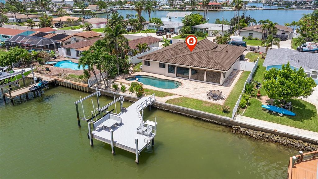 Photo of 565 Crystal Drive, Madeira Beach, FL 33708 (MLS # TB8418508)