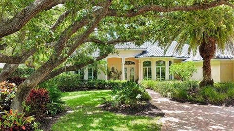 Photo of 402 Macewen Drive, Osprey, FL 34229 (MLS # A4706228)