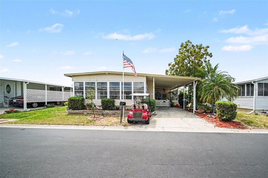 Welcome to Glenwood Estates, a beautifully maintained 55+ community where you own the land and enjoy easy, low-maintenance Florida living. Ideally located just steps from the clubhouse, heated pool, and scenic lake, this well-cared-for home offers the perfect setup for a full-time residence or seasonal snowbird retreat. This home has been thoughtfully updated and meticulously maintained, featuring newer appliances, granite countertops, updated subflooring, new ceiling fans, and a 2020 HVAC system. Recent inspections confirm the roof and electrical panel are in good condition, giving added confidence to the next owner.

Enjoy outdoor living with a fully enclosed front porch, covered carport and patio area, plus a spacious workshop/storage room perfect for hobbies or beach gear. The property is accented by mature landscaping, including a fruit-producing avocado tree and plum tree, creating your own private slice of Florida. Most furnishings—including a golf cart!—convey, making this a truly turnkey opportunity.

Glenwood Estates offers an active lifestyle with a clubhouse, pool, and full social calendar, while the HOA covers sewer, trash, cable, internet, and lawn care for added convenience. Located just minutes from Gulf beaches, shopping, dining, and airports, this is an exceptional opportunity to enjoy the Florida lifestyle at an affordable price point.