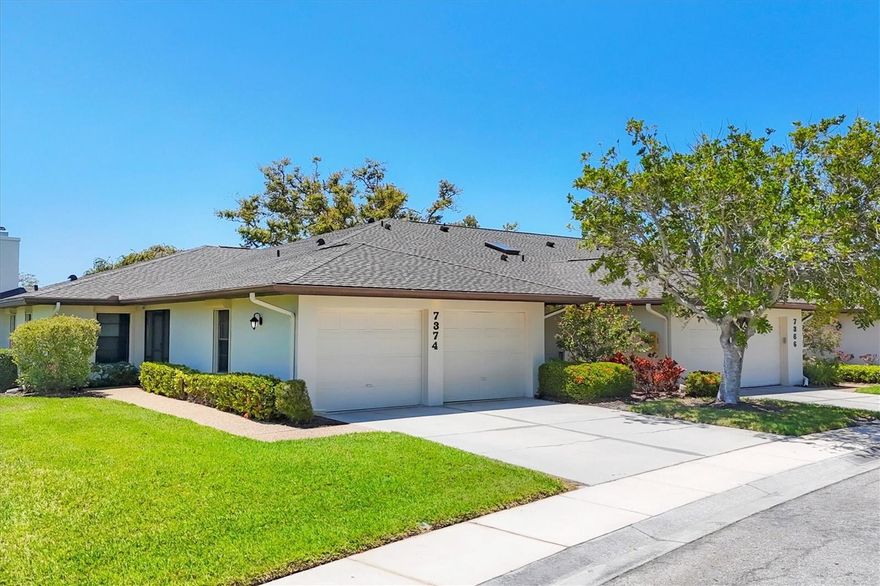 Welcome to a serene slice of Sarasota living in this immaculate maintenance-free villa. Offering peace of mind while tucked away in the lush, 36-acre gated community in Ballantrae within Sarasota’s Palmer Ranch area, this impeccably maintained villa redefines carefree Florida living. With 2,282 square feet of air-conditioned space (2,901 total), this three-bedroom, two-bath end unit offers privacy and comfort of a single-family home, without the upkeep. The villa’s spacious, open-concept design flows seamlessly from its renovated kitchen, featuring light cabinetry and a cozy eat-in area, into expansive living and family rooms adorned with new luxury vinyl plank flooring. An enclosed and vented lanai extends the living space, making it perfect for year-round enjoyment. Inside, the large primary suite boasts a sitting area or office nook, a spacious and well-organized closet, and serene views of the surrounding greenery. Two well-appointed guest rooms with organized wall closets ensure ample room for visitors or hobbies. This villa is move-in ready with numerous upgrades such as replumbing, a 2019 HVAC system, a newer water heater, washer and dryer, hurricane shutters and a new roof in 2024. Easy-care luxury vinyl plank floors and sunshades add to the relaxed, low-maintenance appeal. Ballantrae is cherished for its privacy and tranquility, offering residents a serene, park-like setting. Behind the gates, the community is also well-managed, providing added peace of mind. Condominium dues cover exterior maintenance so homeowners can focus on enjoying the lifestyle. A private walking path leads to the Sarasota Sports Club, where optional memberships offer access to tennis courts, a pool and a fully equipped fitness center. Conveniently near the Legacy Trail, shopping dining and entertainment, and just minutes from the award-winning white sands of Siesta Key Beach, this villa blends tranquility, quality and convenience in one exceptional package.