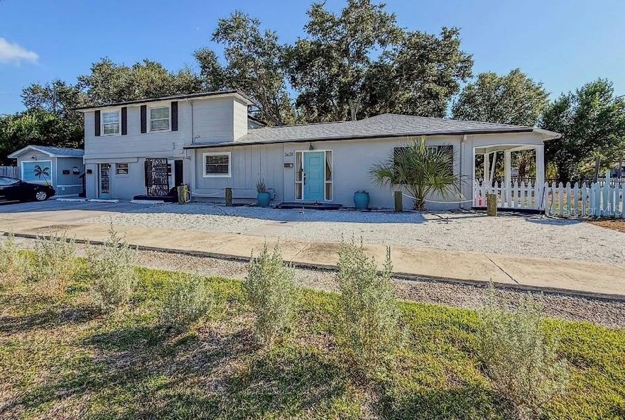 Rare opportunity to own a beautifully updated 3-bedroom, 2-bath pool home with two separate legal 1-bedroom, 1-bath apartment units in the highly desirable Jungle Terrace neighborhood of St. Petersburg. This versatile property is ideal for an owner-occupant looking to offset their mortgage, accommodate multigenerational living or adult children, or generate additional income.
The main residence offers 1,416 sq ft of living space, featuring 3 spacious bedrooms, 2 updated full bathrooms, a newly renovated kitchen, and modern wood-look flooring throughout. Enjoy a private front porch, fenced yard, and the convenience of in-unit laundry.
In addition to the main home, the property features two well-appointed apartment units. The ground-floor unit offers 576 sq ft of living space, including 1 bedroom, 1 full and 1 half bathroom, a modern kitchen, wood-look flooring, and in-unit laundry. The upstairs apartment spans 604 sq ft and features a spacious 1-bedroom, 1-bath layout with an open living area, modern kitchen, large walk-in closet, recently renovated bathroom, and in-unit laundry.
The backyard is a true highlight, featuring a private in-ground heated pool surrounded by a wood privacy fence and a spacious deck—perfect for relaxing or entertaining while enjoying the Florida lifestyle. 
Additional highlights include a one-car garage, heated pool, and a new roof (2023), all situated in a high-and-dry location with no flood insurance required.
Ideally located just minutes from Madeira Beach and Treasure Island, with easy access to Tyrone Mall shopping and dining, and only a short 15-minute drive to vibrant downtown St. Petersburg. Don’t miss this rare opportunity to own a versatile pool home offering income potential, multigenerational living, or space for adult children in one of St. Pete’s most desirable neighborhoods!