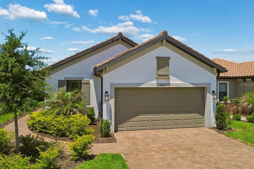 Why wait to build, when this custom Arezzo villa in Esplanade of Wiregrass is available? Well-appointed 1,926 SF, 3 bedrooms, 2 baths, plus office/flex room, 2 car extended garage and extended screened lanai.  You will notice the attention to detail as you enter the open floor plan, upgraded gourmet kitchen overlooking a large family room and dining room, featuring upgraded 42” solid wood cabinets with crown molding, upgraded quartz counters, upgraded stainless steel appliances, stainless steel farm sink, pantry, custom tile backsplash, and lots of  counter space.  The owner’s suite has dual sinks, large shower, a dual sided walk-in closet with custom built-ins, and a tray ceiling. The family room boasts a tray ceiling and lots of natural light. Bedroom 2 has a pocket door to bathroom 2 which can serve as an ensuite, double sinks and a bathtub/shower combination.  Bedroom 3 is oversized and has ample light. This one-story Taylor Morrison custom home has an open floor plan with an extensive list of upgrades. These upgrades include but are not limited to designer tile floors throughout in common areas, 8 foot doors, separate dining room, and office, French doors in the office, ceiling fans, blinds, quartz counters, extended paver driveway, barrel tile roof, gutters, large laundry room with cabinets & sink, garage with 4 foot extension, reclaimed water sprinkler system, and custom lighting package. 
Step out on to the covered and extended screened lanai enjoy your best Florida life.  Esplanade of Wiregrass Ranch has a luxurious upscale club house with full-time lifestyle and fitness directors. Esplanade of Wiregrass is an active 55+ community with resort style amenities. This home is a short walk to the Venue which includes a resort style pool, hot tub, cabanas, dog park, state-of-the-art 24-hour fitness center, billiard/card room, and spa room. For active outdoor entertainment there is a firepit, tennis courts, 8 pickleball courts, two bocce courts, as well as a large meeting/gathering area.  Esplanade also includes worry free yard maintenance, reclaimed water and Spectrum TV and internet package included in fees.   This home is located only minutes from shopping, I-275, I-75, hospitals, restaurants, recreation, and entertainment.  Come see for yourself this exquisite residence that is ready for you to move in and call it home! Please see walkthrough and 3D tours.