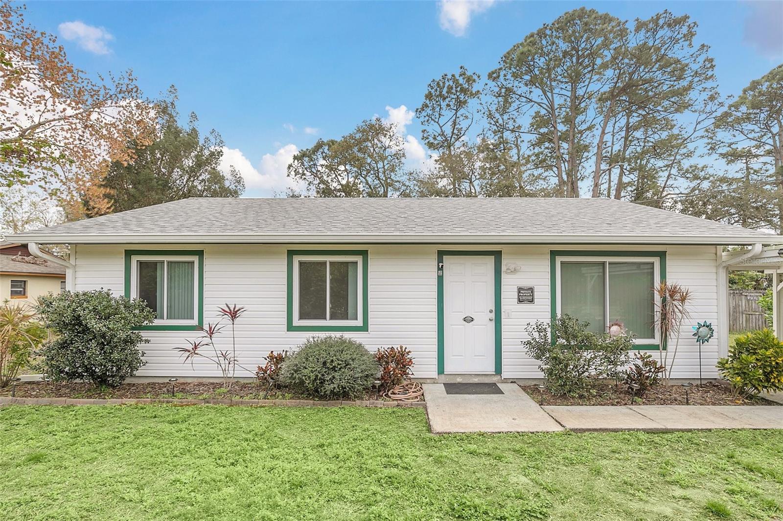 Welcome to this meticulously maintained Port St. John home, which boasts gorgeous, updated landscaping offering privacy and enhanced curb appeal. Features include 2019 roof, 2017 A/C system, updated tiled shower and tile throughout the home, rain gutters, well sprinkler irrigation system, reverse osmosis filtration system in the kitchen, 2023 Bosch dishwasher, hurricane impact windows, and brand-new exterior lighting fixtures. This home has an open floor plan that seamlessly connects the living room and kitchen where you will find plenty of cabinets, generous counter space and an eat-in area. The beautiful and spacious privacy fenced backyard is perfect for outdoor entertaining. You will love the mature trees, fire pit and 25'x4' organic raised bed garden ready for you to plant. With two sheds (one with power), there's ample storage space for all your gardening tools or recreational gear. Large storage room accessible from the exterior offers additional storage. Don't Miss This One!