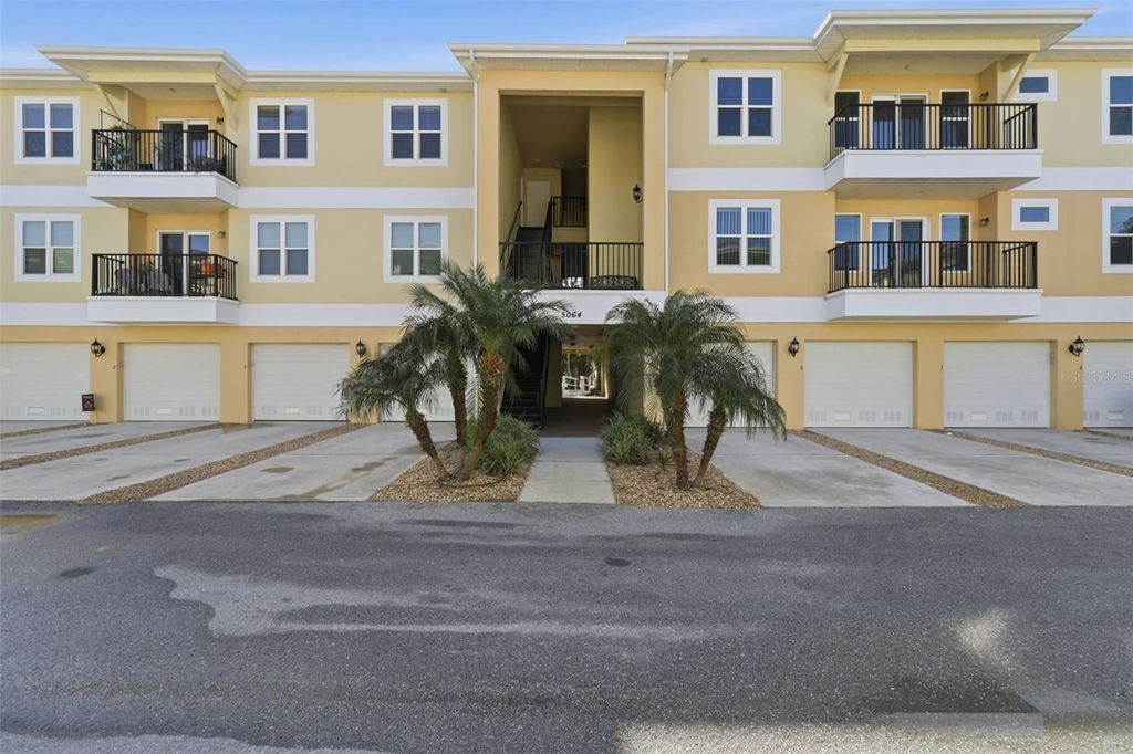 Photo of 5064 Royal Palms Way #301, New Port Richey, FL 34652 (MLS # W7880680)