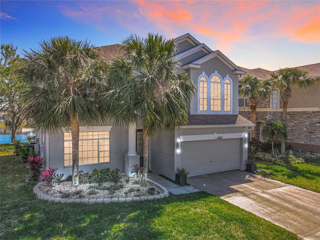 Photo of 13430 Meadow Bay Loop, Orlando, FL 32824 (MLS # O6437845)