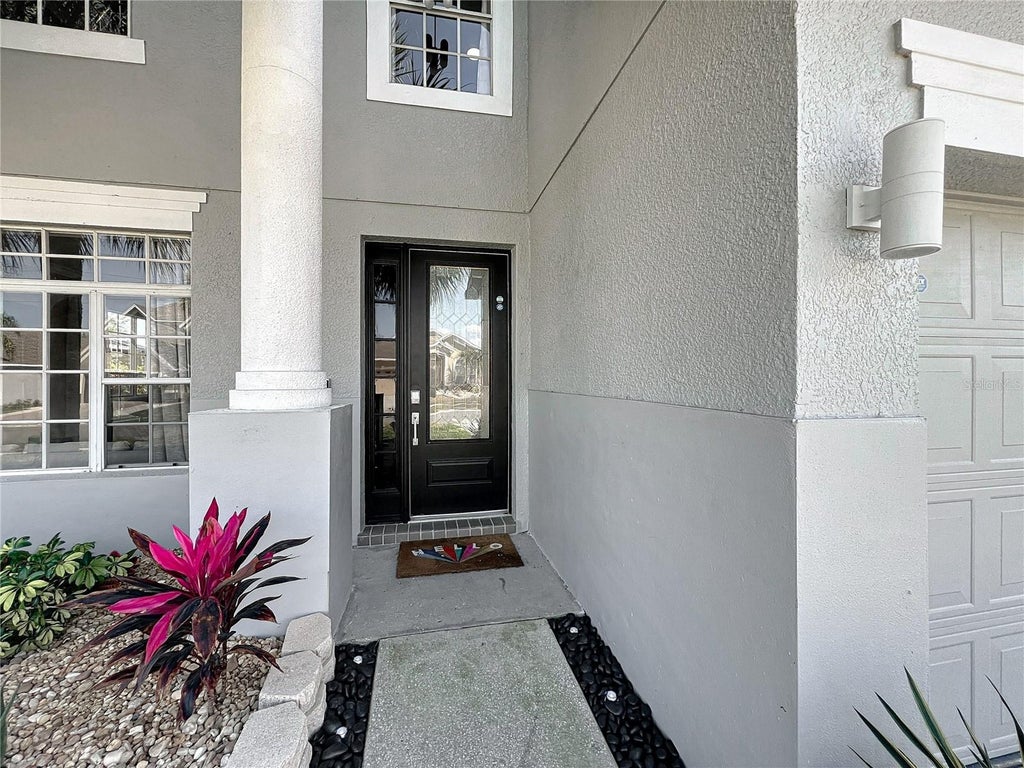 Photo of 13430 Meadow Bay Loop, Orlando, FL 32824 (MLS # O6437845)