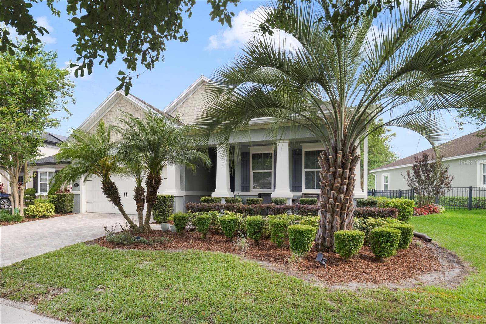 This gorgeous 2 Bedroom/2 Bath/Den/ "Lantana" model Kolter built home is perfect for retired, single and young couples alike. It is located in the much sought after community of Victoria Hills in Deland Florida. This home has it all, 1933 square feet under AIR with a 190 square foot covered front porch and a 188 square foot covered lanai! Step out of your car onto the paver drive and take the paver walkway up to the custom front porch. You feel like you are in an old time movie with great views of your neighbors and their wonderful homes. You can sit out there in the evening and sip your favorite beverage and visit with your friends and neighbors as they walk by. Walk through the front door and you can see all the way through to your lanai and the conservation area behind your home. On your right is the mini-master suite with it's own shower/tub bath and walk-in closet. It has a custom fan and overlooks the front porch. The flooring in the main hallway is wood pattern tile that is 6x24 inch planks. That floor tile runs throughout the foyer, great room, kitchen, dining, the second bath, utility room and the hallways. The ceilings are 10 feet tall throughout the home and all the doors are 8 foot doors. The utility room and the garage are on the left of the hallway. On the right you have your Den/Office with custom french doors. The Great Room and Primary Suite have trey ceilings. The access to the lanai is a triple sliding door system. The lanai has the same paver system as the front driveway and the front porch. Both the front porch and the rear lanai are fully covered. There is a private security system. The kitchen has extra 42 inch cabinets along the side wall with a quartz counter top like the main kitchen area. The pantry is a large walk-in closet with plenty of shelving. The kitchen appliances are stainless steel. There are 3 custom pendent lights over the eight foot long island sitting area that also has quartz counters and a stainless sink. The kitchen and bath cabinets match. The cook-top, oven, and tankless hot water heater are all natural gas. There is a floor outlet in the great room and a laundry room rough-in for a sink. The open concept great room/dining area/kitchen is 25x30 feet and allows space for holiday get together's and parties with your friends and neighbors. Plus you have another 188 square feet on the covered lanai. The back yard is fully fenced and the conservation views are of beautiful mix of trees and grassy areas. A very quiet and a great place to enjoy your family and friends. The primary suite is an impressive 17x14. The ensuite has his and her sink cabinets. The walk-in shower is fully tiled. Beyond the bath area is a custom 17x7 walk-in closet. This community via the HOA fees provides you with free irrigation reclaimed water for your custom irrigation system, plus Spectrum Select Plus and Fiber-Optic Gig internet services, that normally cost $185.00 a month. You also get access to 2 amenity complexes with pools, tennis courts, private parks, walking trails and the public golf course. There are many medical offices and hospitals in the area. There is plenty of shopping and Restaurants in downtown Deland, a Publix Shopping center just 2 miles away and more stores in Orange City. Stetson University in Deland has activites like football, baseball and a Christmas music festival. The Atlantic Beaches are nearby in Daytona Beach. Disney and Universal are 90 minutes away on the other side of Orlando.