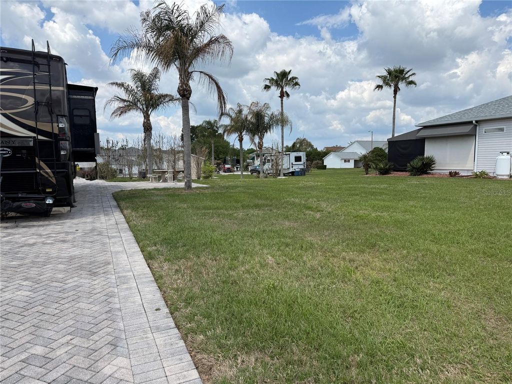 Photo of 1030 Rally Drive, Polk City, FL 33868 (MLS # L4960620)