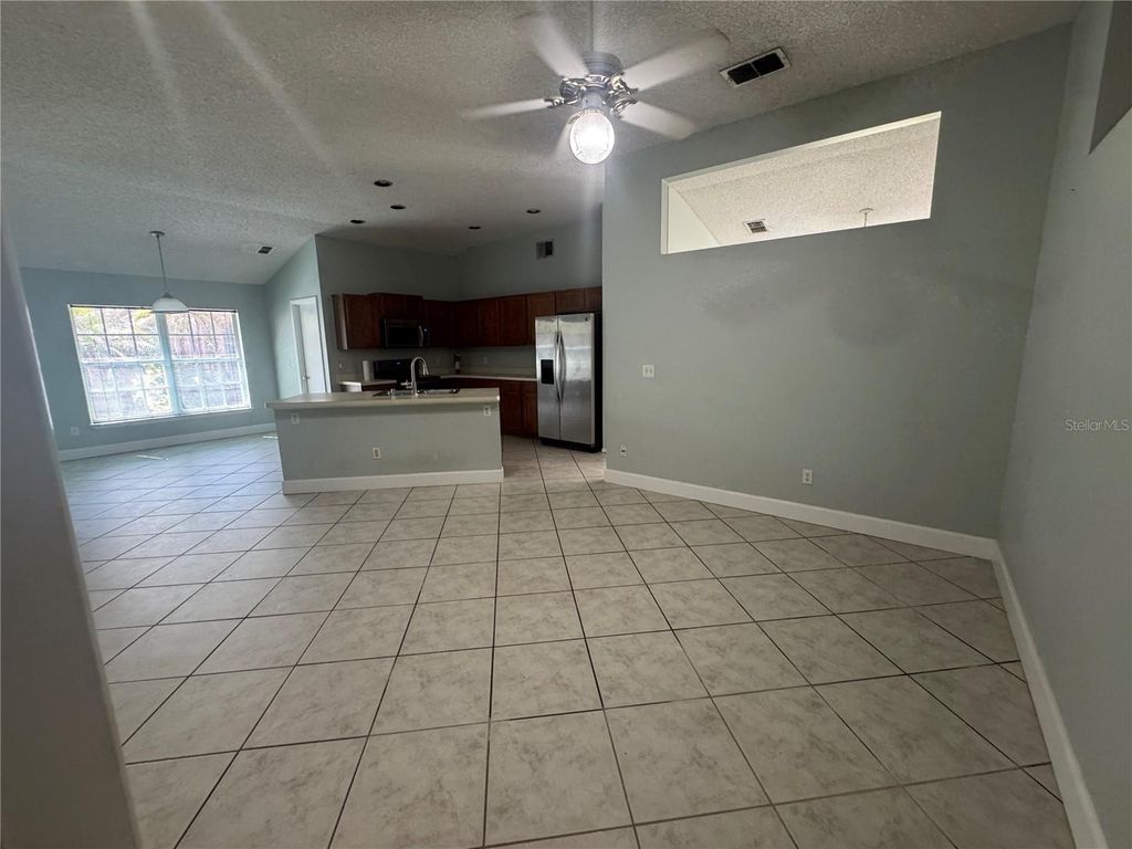 Photo of 10941 Mill Pond Way, Orlando, FL 32825 (MLS # O6422623)