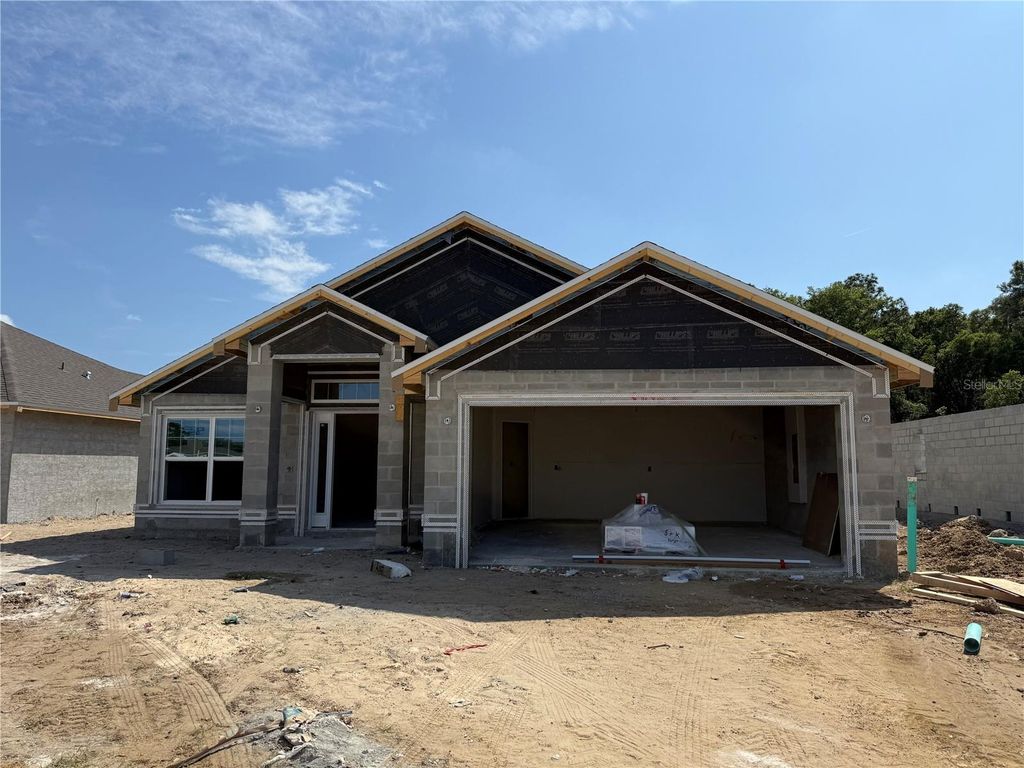 Photo of 2190 NW 23rd Loop, Ocala, FL 34475 (MLS # OM724130)