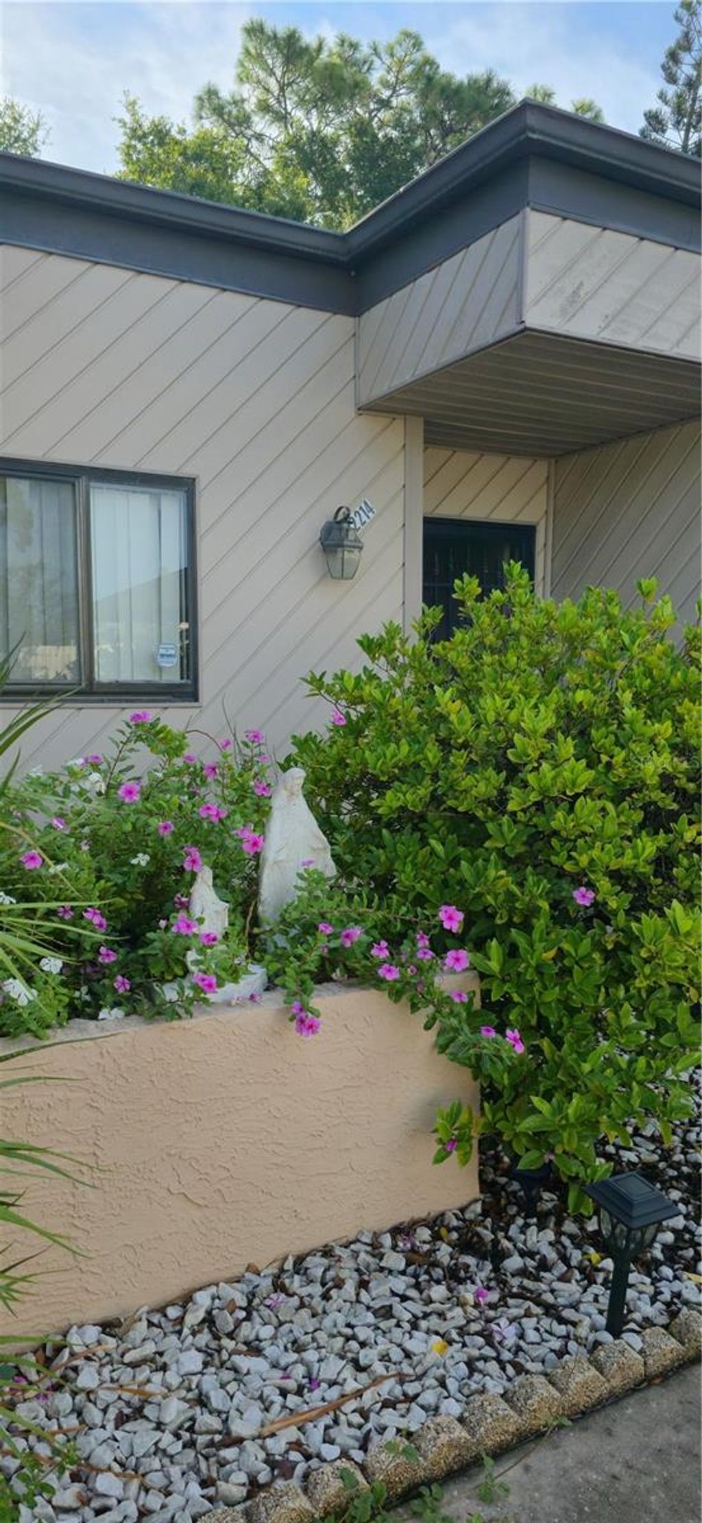 Photo of 2214 Oak Wind Drive, Holiday, FL 34691 (MLS # TB8417286)