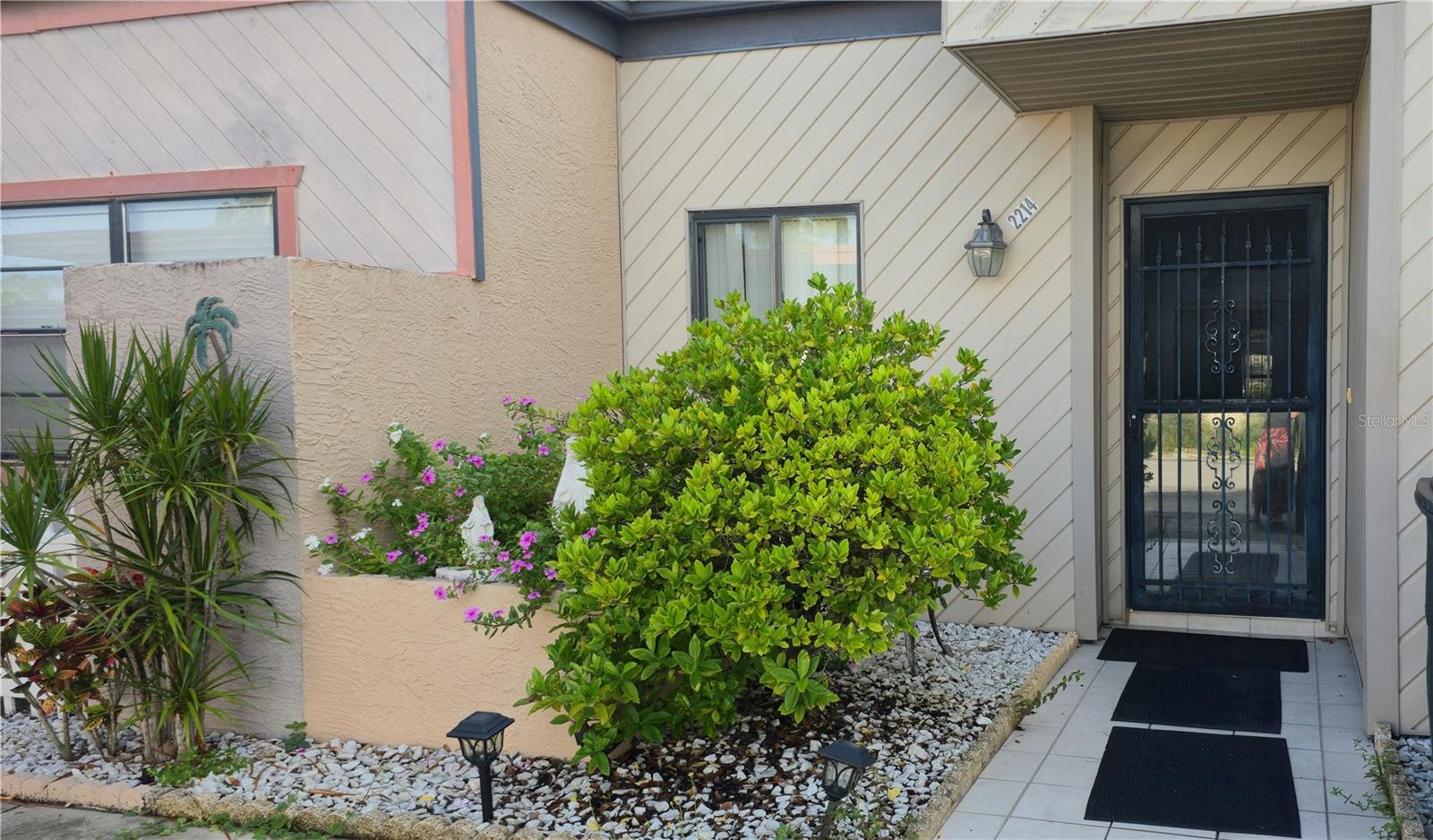 Serene Pinewood Villas neighborhood is close to shopping and dining for convenience. This two bedroom two full bath home has tile flooring throughout. Extra living area makes this one of the larger units in the community with an extra large side lot for gathering with friends. Main living area has high ceilings with windows allowing for extra light. Community has sparkling pool, clubhouse and shuffleboard with picnic tables for grabbing lunch by the pool. Low HOA fee makes this a affordable place to live. Hot water heater replaced 2020. Newer kitchen faucet and garbage disposal. Washer just one month new. Thermostat fully programable and newer. Call to make an appointment today.