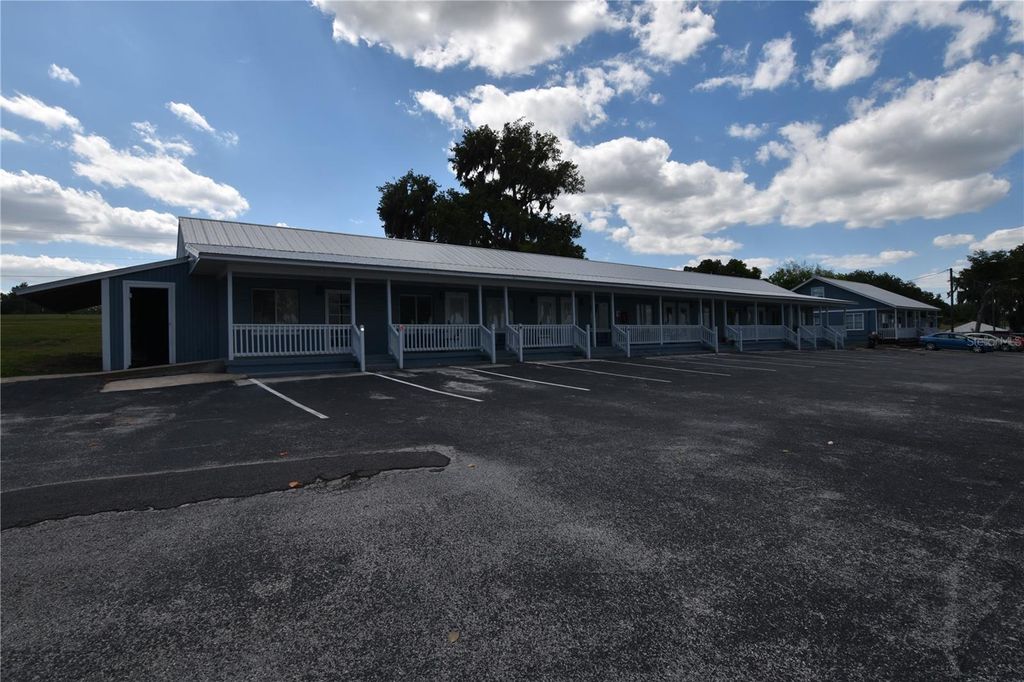 Photo of 704 S Lakeshore Boulevard, Howey In The Hills, FL 34737 (MLS # G5111363)