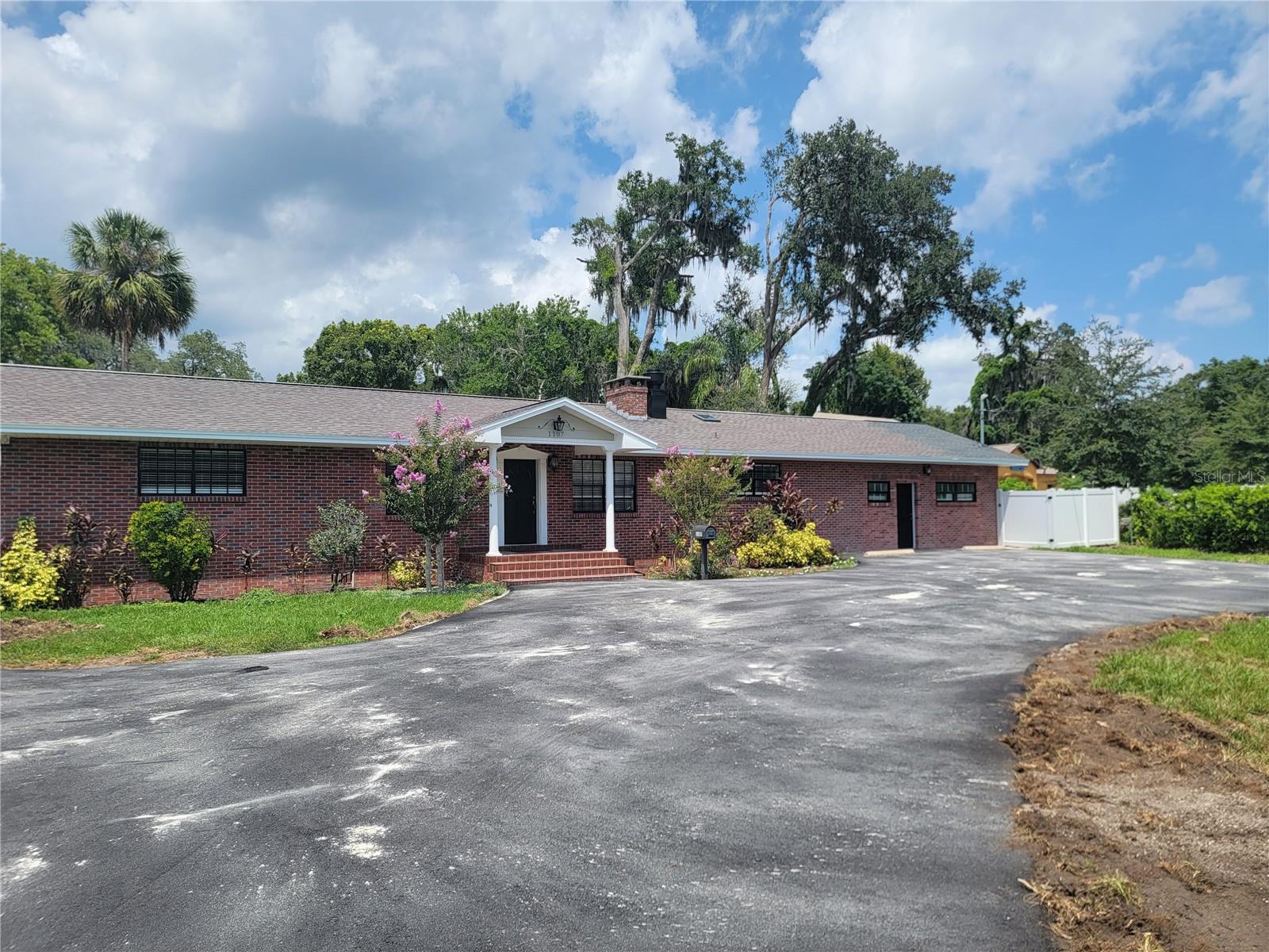 This commercial property at 1107 Lithia Pinecrest Road in Brandon, is an exceptional find for any business businesses seeking prime single-use commercial space, with high visibility, plenty of private parking. This property is situated in the heart of Brandon near the corner of its most highly trafficked roads (Lithia Pinecrest and Lumsden Roads), making it highly visible and easily accessible.
Visibility-With its own marquee, businesses can benefit from maximum exposure to potential customers. This lighted sign cannot be missed and gives any business a look of stability and longevity.
Space-The building interior offers 2388 heated square feet, providing ample space for businesses to thrive. The outdoor space is ready for your personal touch. The large deck and green space can be designed to accommodate weddings, outside dining areas, kennels, or any number of accessory uses. Whether it is for a restaurant, office space, assisted living, or other neighborhood services, the property's size can cater to a variety of needs.
Access-This stand-alone property has great visibility and is convenient location makes it easy for customers, clients, and employees, to get to and from the location. This can result in a broader customer base and higher employee retention rates.
Parking-The property sits on .69 acres with a large fenced-in area in the rear, making it ideal for fleet parking or customer parking.
Special Feature-The kitchen is mammoth in size and features a wall oven and commercial cooktop which adds to the appeal of the property to be used as a live-work facility, small church, or group home.
Overall, 1107 Lithia Pinecrest Road in Brandon, FL is a fantastic opportunity for businesses in need of space. Don't miss out on this chance to lease a property that can give your business the boost it needs. Note: Double Net Lease-taxes and insurance expenses are included in the lease payment. The lessor pays maintenance costs. It is important to check the current zoning to ensure it conforms to your particular business use.