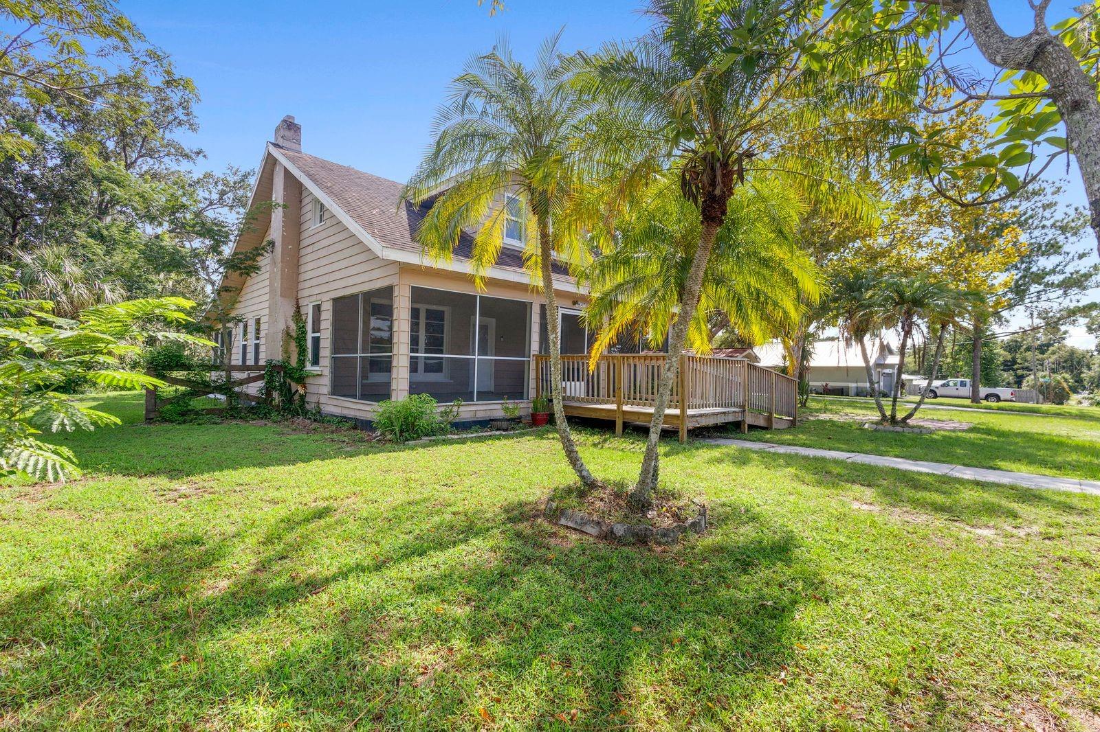 Step into a piece of Clermont’s history with this charming 1920s home, perfectly situated on an oversized lot just south of Hwy 50. Enjoy a prime location only a few blocks from Lake Minnehaha and just over a mile to vibrant downtown Clermont and scenic Lake Minneola. This spacious 4-bedroom, 2-bath home blends historic character with important modern updates. Major systems have been thoughtfully maintained, including updated electrical, plumbing, added insulation, a reverse osmosis system in the kitchen, and a whole-house water softener—leaving you to focus on making the space your own. Relax on the large, screened-in front porch with a glass of iced tea, or bring your design vision to life inside, where you’ll find original wood floors, rich wood trim, a classic staircase, and built-in shelving. With timeless charm and a solid foundation, this home is ready for its next chapter.