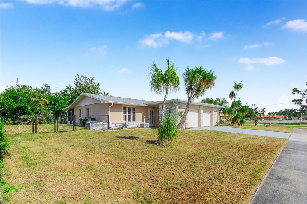 Photo of 6014 Deming Avenue, North Port, FL 34287 (MLS # TB8446371)