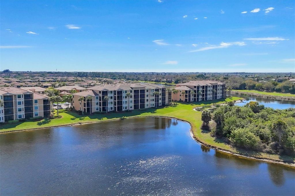 Photo of 6509 Grand Estuary Trail #203, Bradenton, FL 34212 (MLS # A4651086)