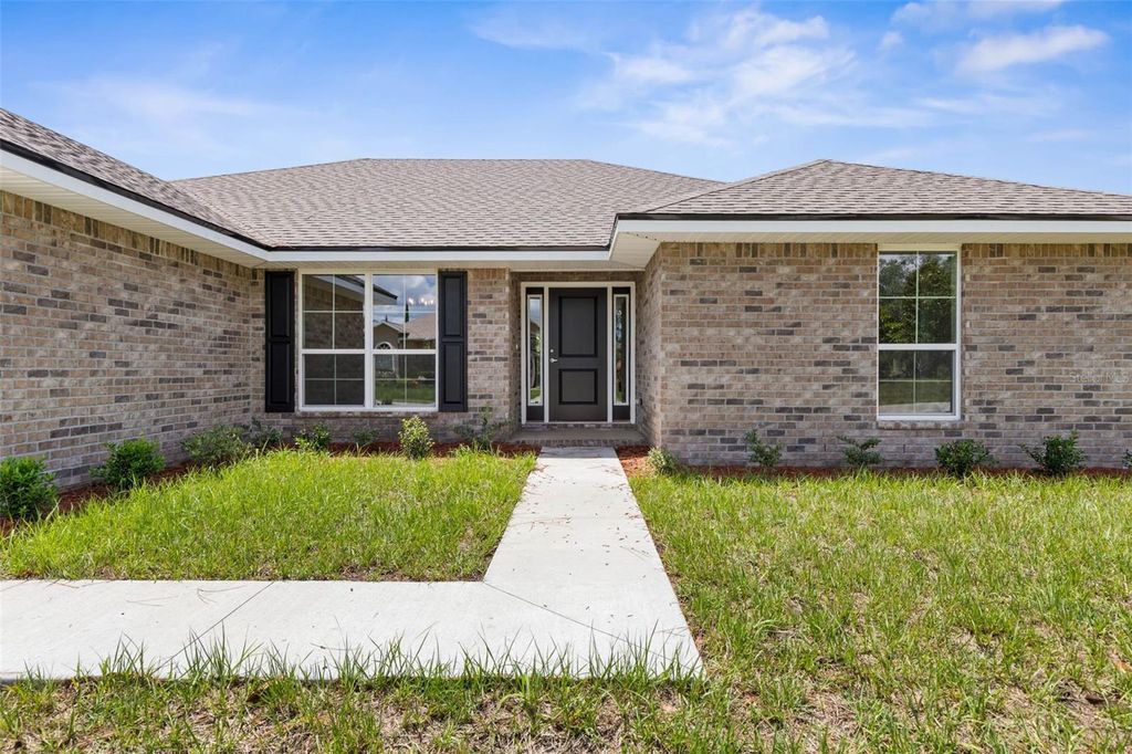 Photo of 29 Westgrill Drive, Palm Coast, FL 32164 (MLS # FC313524)