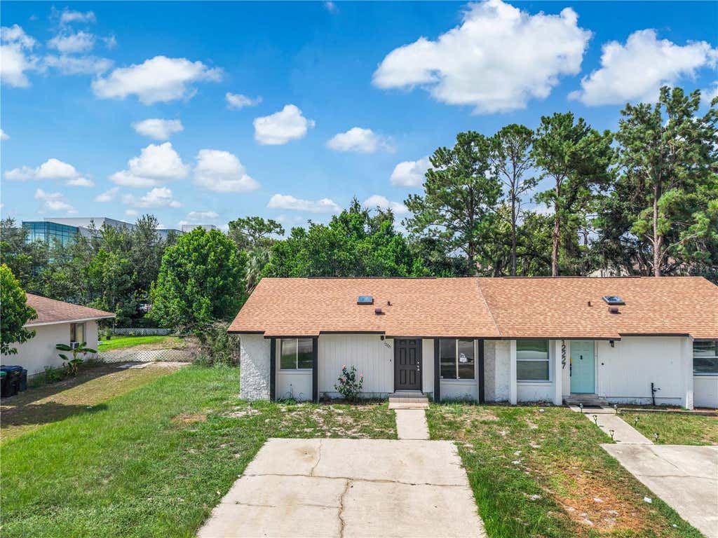 Photo of 12225 Coral Reef Drive, Orlando, FL 32826 (MLS # S5154562)