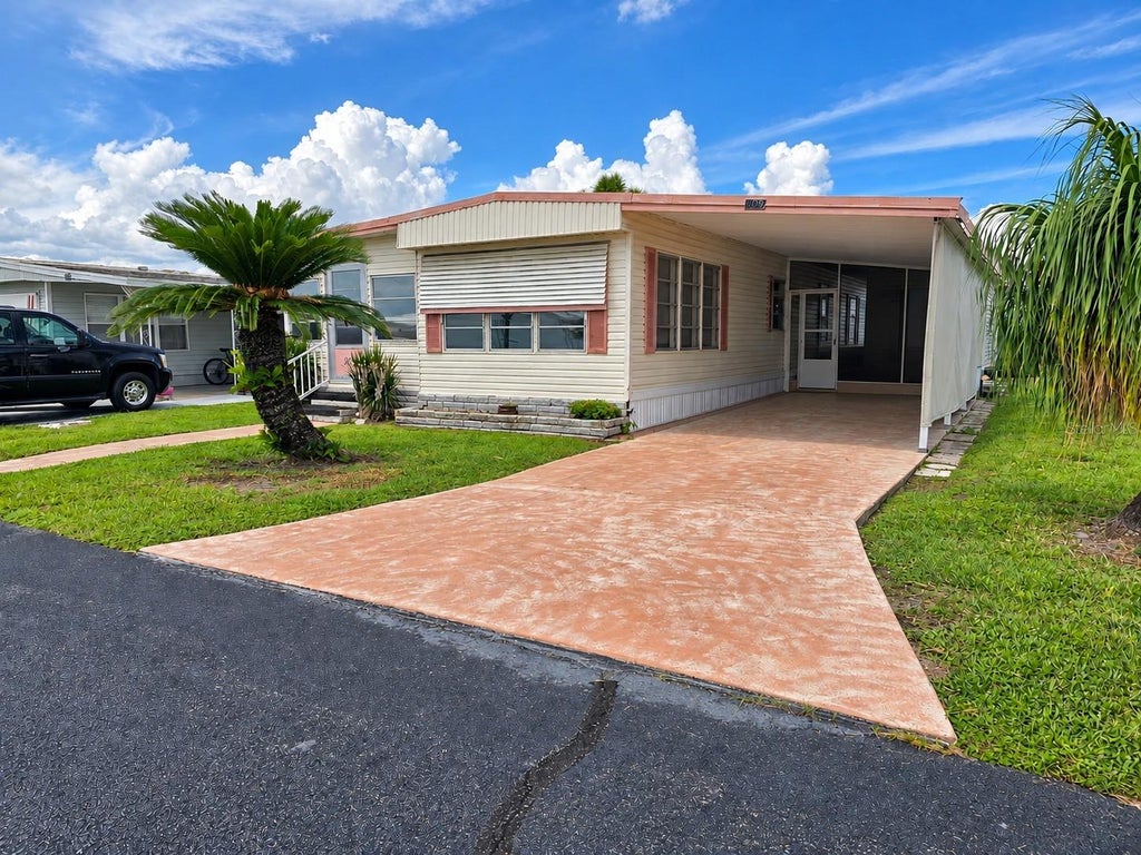 Photo of 209 Orchid Terrace, Haines City, FL 33844 (MLS # P4940069)