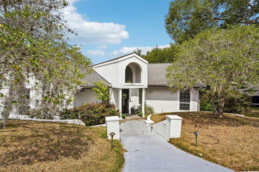 Spacious 4 bedroom, 4 bathroom pool home on a corner lot in Fruitland Park offering over 2,400 sq ft and a flexible layout designed for real life. Enjoy Florida living with a screen-enclosed pool and spa—perfect for relaxing or entertaining—while the interior features high ceilings, an open floorplan, and tile flooring throughout the main living areas. A rare highlight is that each bedroom has access to its own bathroom, providing comfort and privacy for all, and Bedroom 2 includes a bonus flex space ideal for a home office, playroom, or walk-in closet. The in-law suite off the garage adds exceptional versatility for multi-generational living, guests, or potential income-producing use. Additional features include a circular driveway, 2-car garage, oversized laundry room, and private well system. Conveniently located just 15 minutes from The Villages and approximately one hour to Walt Disney World and Universal Studios, as well as Florida’s beautiful beaches. No HOA.
