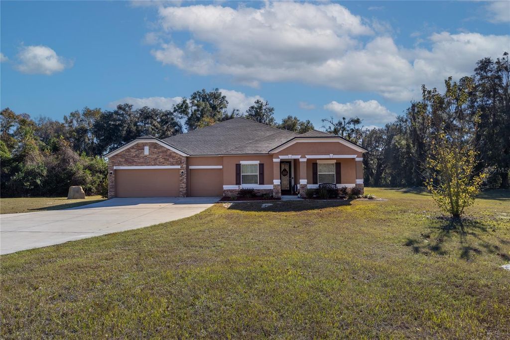 Photo of 6075 SW 215th Terrace, Newberry, FL 32669 (MLS # GC536031)