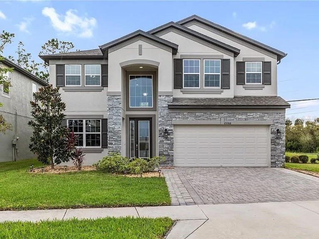 Photo of 2216 Woodmen Hall, Land O Lakes, FL 34637 (MLS # TB8531663)