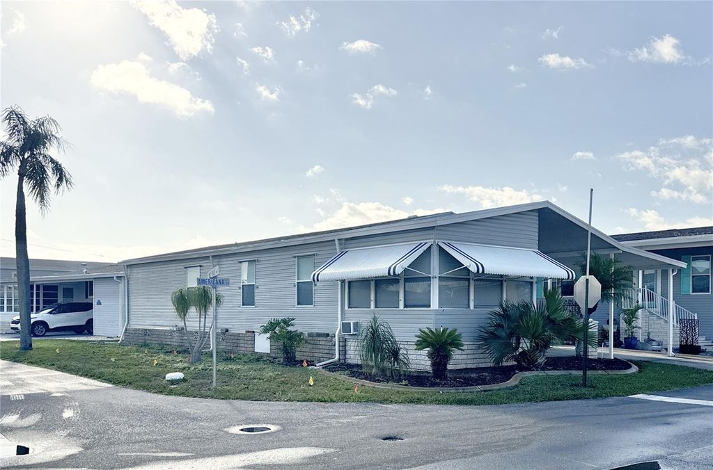 Photo of 6907 Americana Drive NE #101, St Petersburg, FL 33702 (MLS # TB8486983)