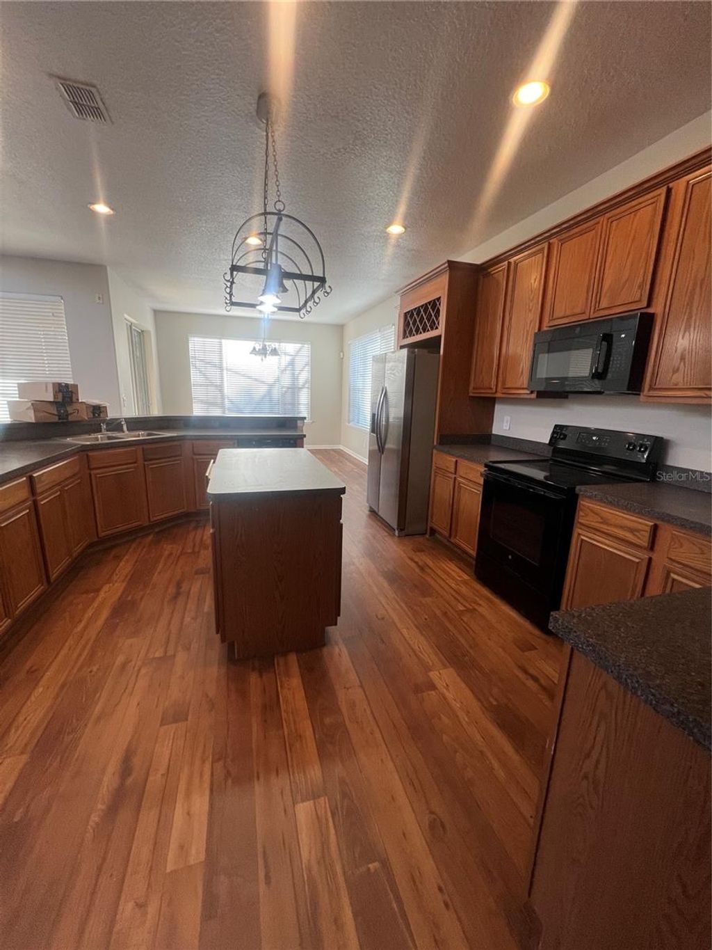 Photo of 14643 Huntcliff Park Way, Orlando, FL 32824 (MLS # O6379336)