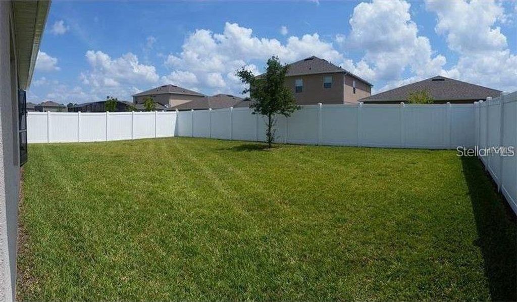 Photo of 10525 Cabbage Tree Loop, Orlando, FL 32825 (MLS # O6401592)